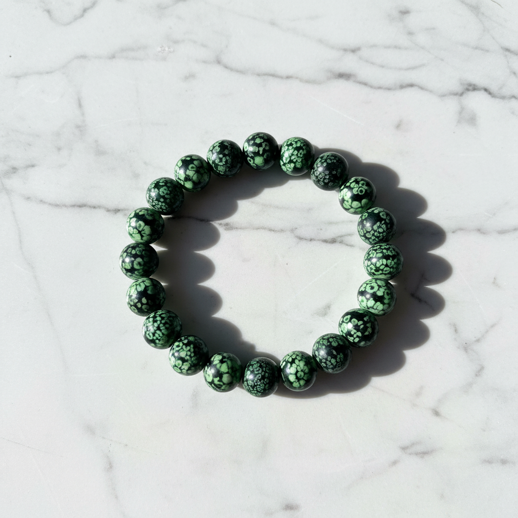 Black Green Floral Beaded Bracelet white marble flat lay